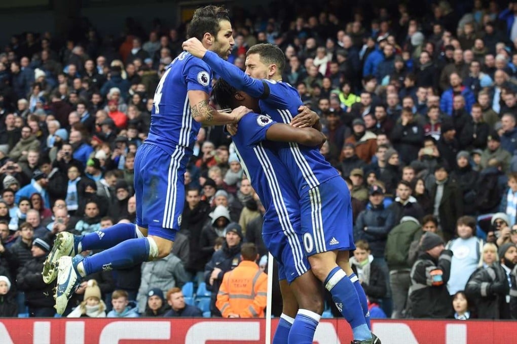 Chelsea's Belgian midfielder Eden Hazard celebrates scoring his team's third goal. AFP