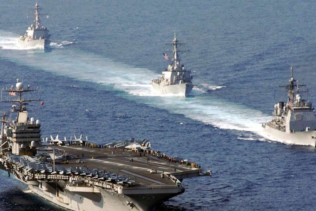 USS Mobile Bay, USS Russell and USS Shoup perform a pass and review with the Nimitz-class aircraft carrier USS Abraham Lincoln. Photo: SCMP Pictures