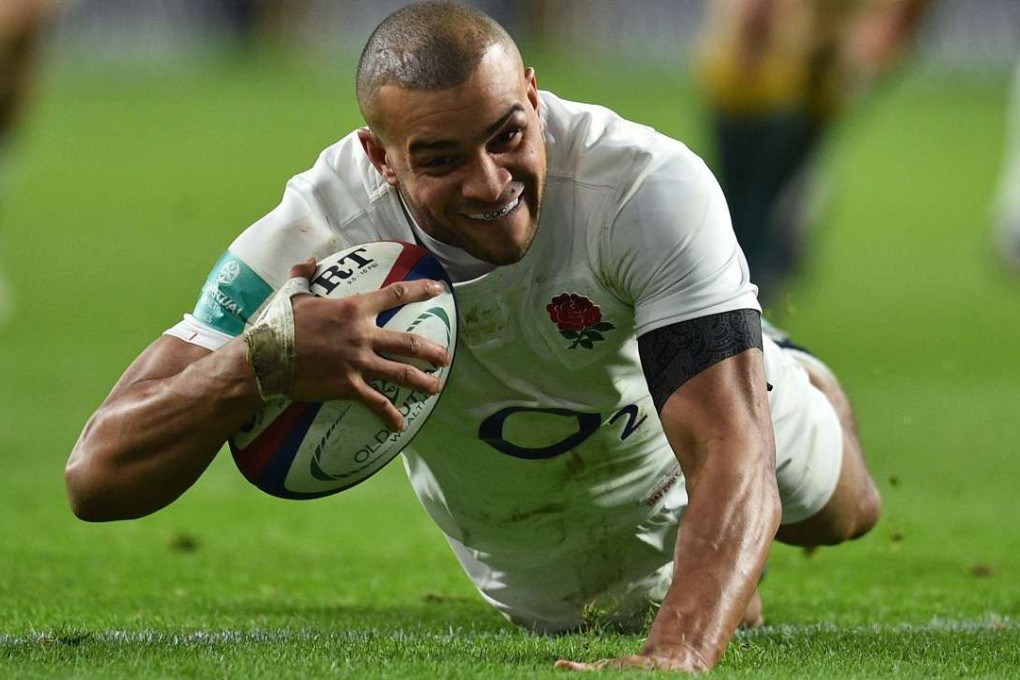 England centre Jonathan Joseph scores his second try against Australia at Twickenham. Photo: AFP