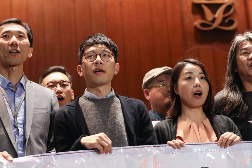 Edward Yiu (left), Nathan Law, Lau Siu-lai and ‘Long Hair’ Leung Kwok-hung protest against the government action. Photo: Nora Tam