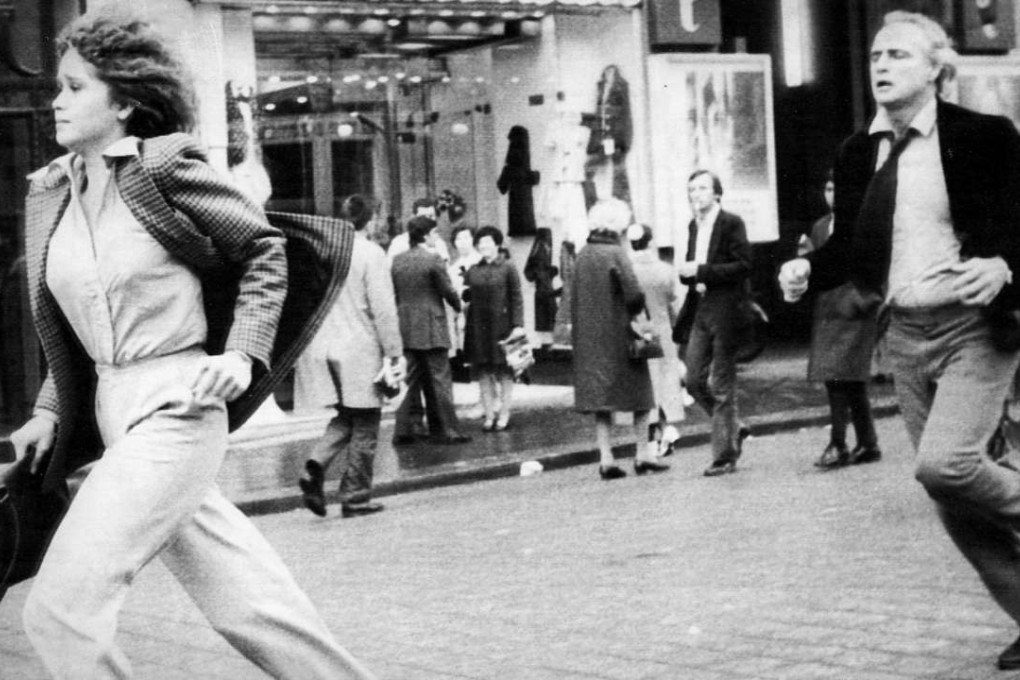 Marlon Brando chases Maria Schneider in a scene from Last Tango in Paris. Photo: AP