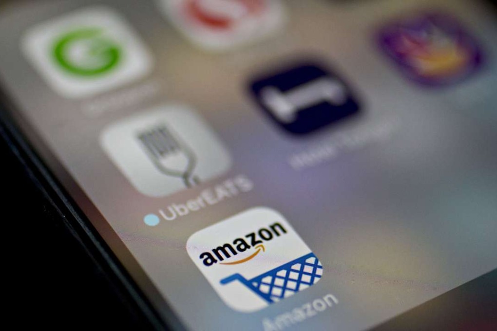 The Amazon.com application icon is displayed on an Apple iPhone in Washington, DC. Photo: Bloomberg