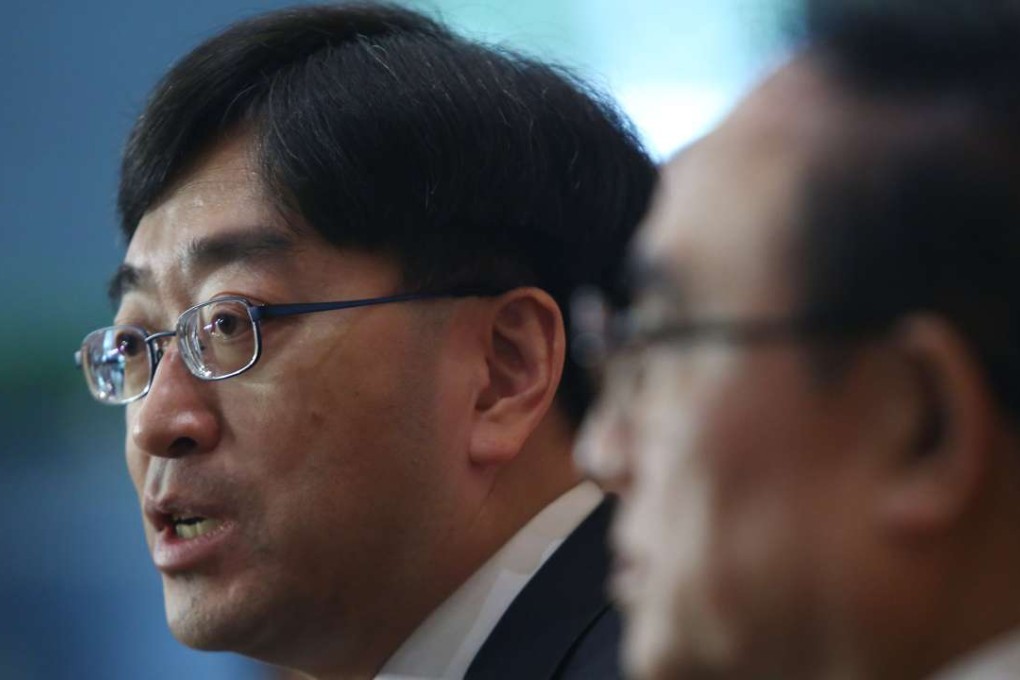 Secretary for Food and Health, Dr Ko Wing-man (left) maintained the government will work to include those not covered under health insurance in the next phase in a few years. Photo: Sam Tsang