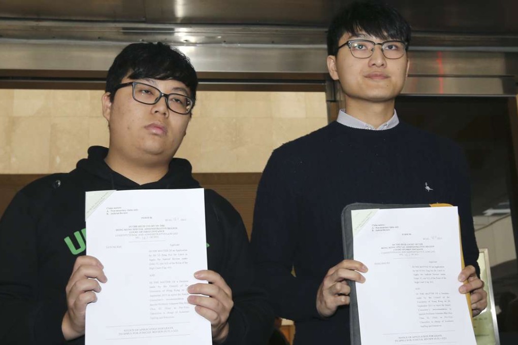 Coleman Li (left) and Billy Fung display their court writs outside the High Court. Photo: Dickson Lee