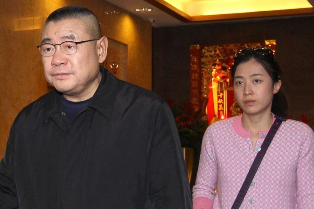 Joseph Lau (Left) leaves a restaurant with Chan Hoi-wan. Photo: Dickson Lee