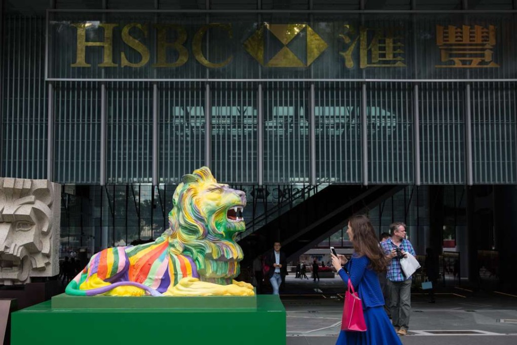 Replicas of the HSBC lions painted in rainbow colours, displayed outside the bank's headquarters in Hong Kong on Tuesday. Its shares enjoyed strong gains. as Morgan Stanley double upgraded the stock from underweight to overweight. Photo: EPA