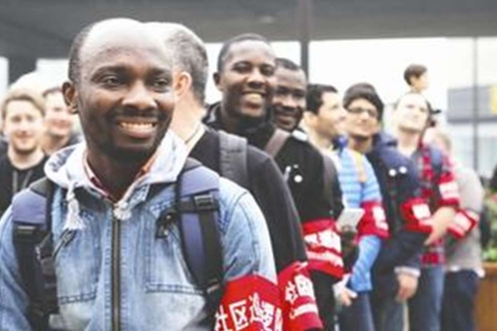 The eight foreign ‘community inspectors’ attend to the needs of expatriate residents in Chengdu. Photo: SCMP Pictures