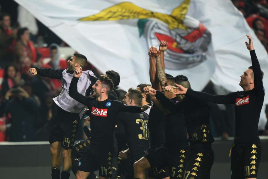Napoli players celebrate their victory after the Uefa Champions League against Benfica at Luz stadium in Lisbon. Photo: Xinhua