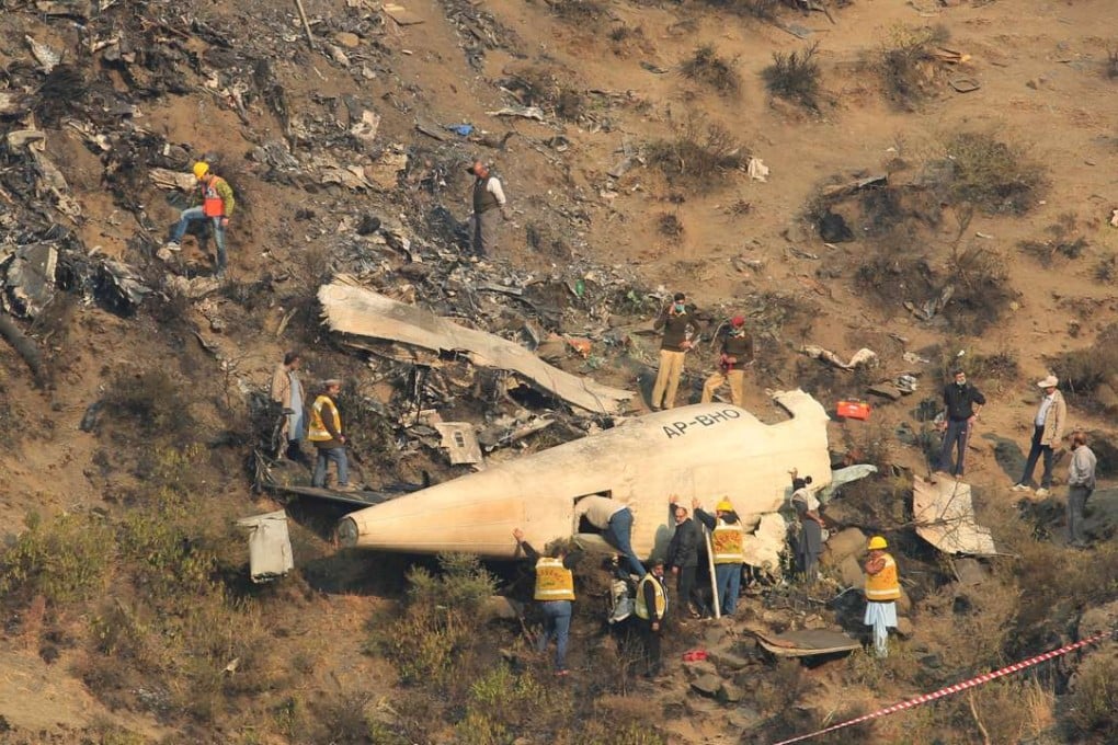 The Pakistan International Airlines flight crashed into a hillside after one of its two turboprop engines failed. Photo: Reuters