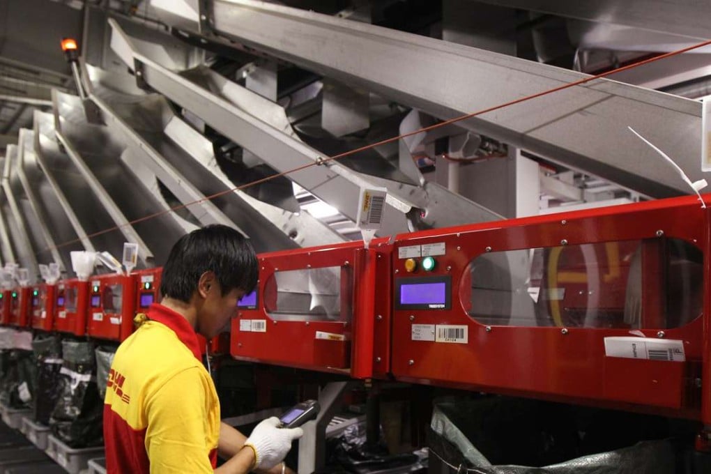 A DHL worker at its Central Asia Hub at Hong Kong International AirportPhoto: Dickson Lee