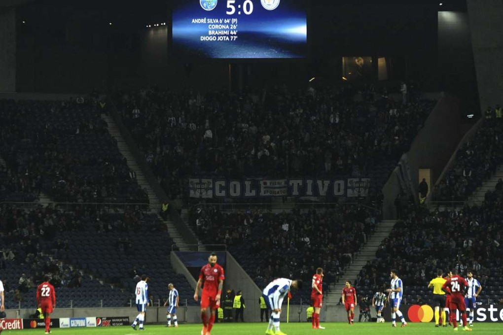 A video screen displays the final score during the final minutes of a Uefa Champions League match between FC Porto and Leicester. Photo: AP