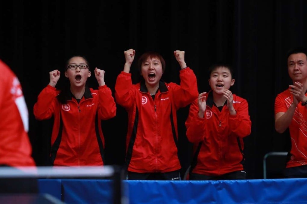 (From L-R) Wong Chin-yau, Minnie So, Mak Tze-wing and coach Li Ching cheer on Liu Qi in the team event at the junior World Championships in Cape Town.