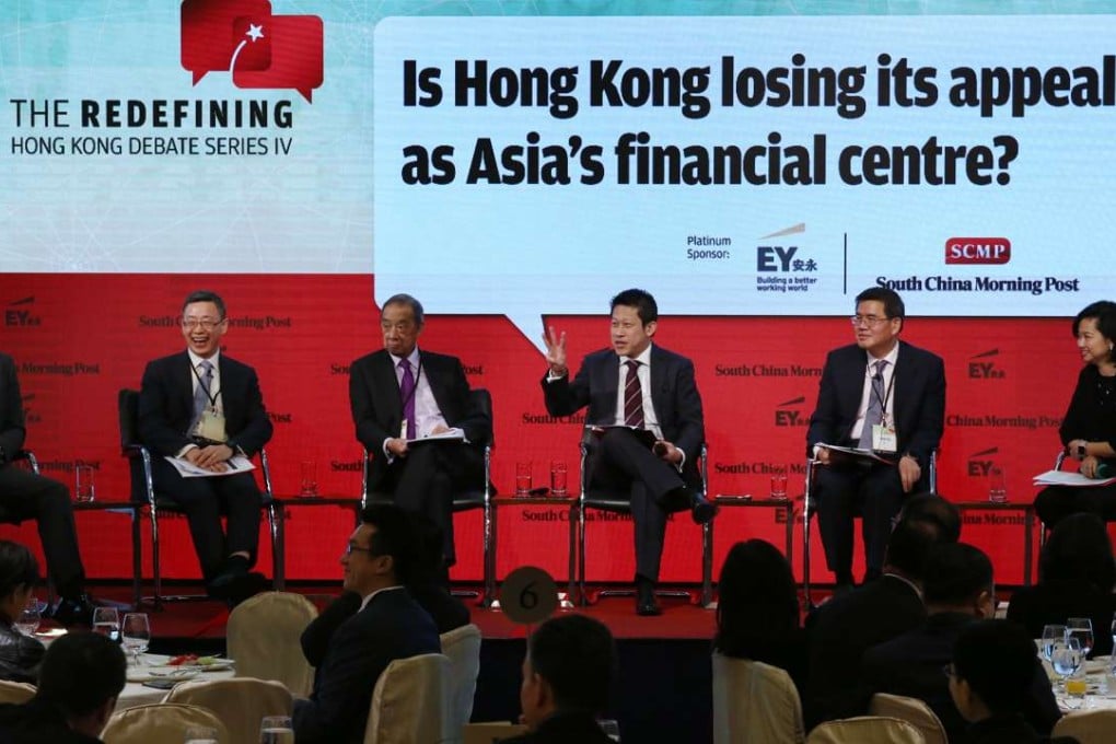 Speakers at the panel discussion. From left, Francis Edwards, King Au, Ronald Arculli, SCMP business editor and moderator Eugene Tang, Albert Ng and Christine Ip. Photo: Jonathan Wong