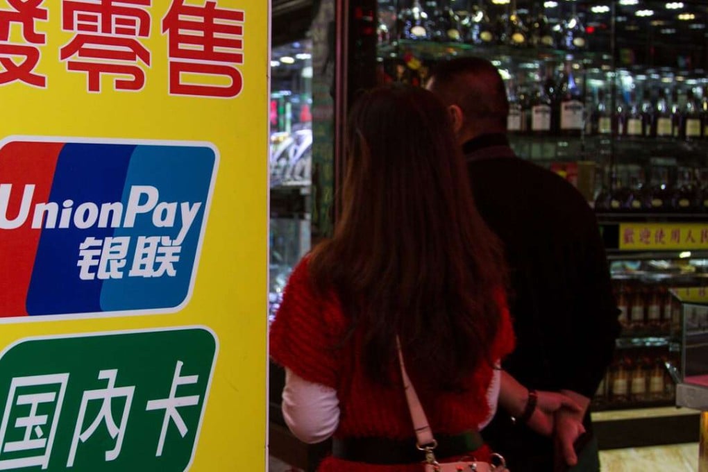 The plunge in casino shares came after the Post reported that Macau was preparing to slash in half the amount of cash China UnionPay bank card holders can withdraw from ATM machines. Photo: Reuters