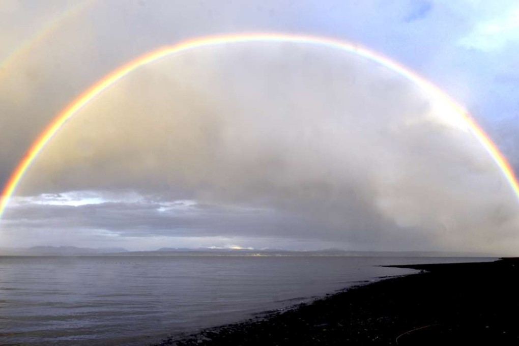 A rainbow at Port Susan near Stanwood, Washington state. Photo: AP