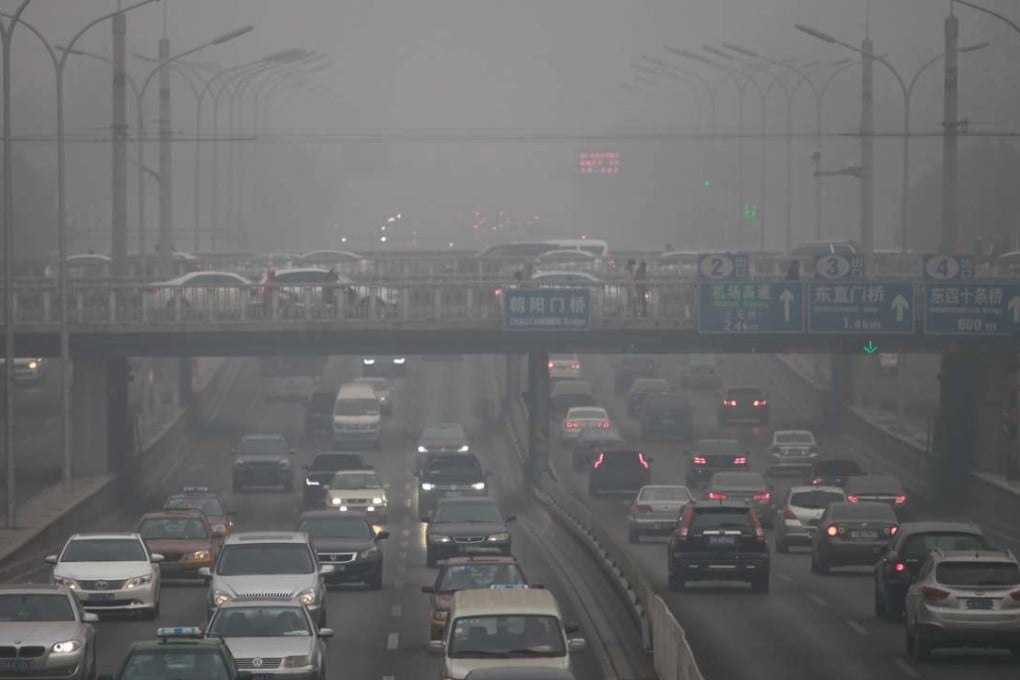 Early morning traffic on the Beijing’s second ring road is hard to see on a smoggy day. Photo: SCMP Pictures