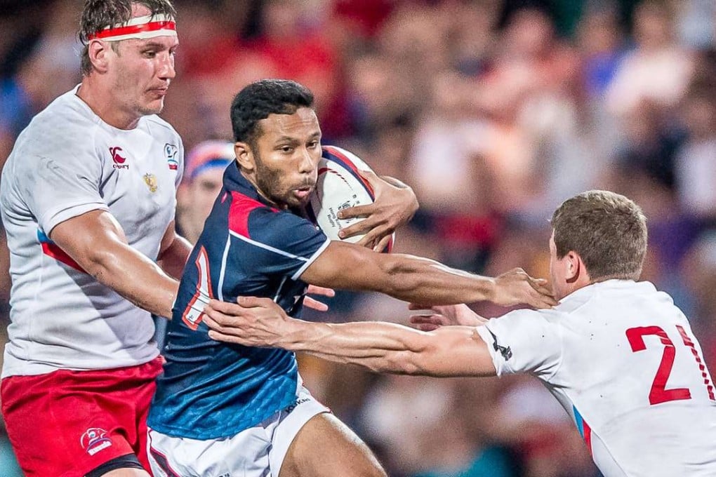 Up and coming Hong Kong scrum half Jason Jeyam attacks against Russia in the Cup of Nations. Photos: SCMP Pictures