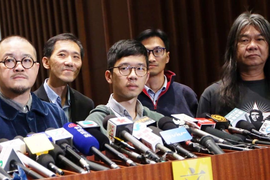 (From left) Legislators Shiu Ka-chun, Edward Yiu Chung-yim, Nathan Law Kwun-chung, Eddie Chu Hoi-dick and Leung Kwok-hung could face disqualification from the Legislative Council. Photo: David Wong