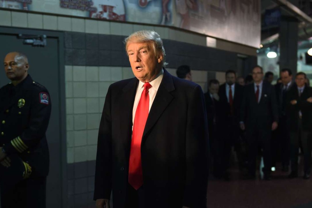 US President-elect Donald Trump talks with media, after his meeting with families and victims of last week's attack at Ohio State University. Photo: AFP