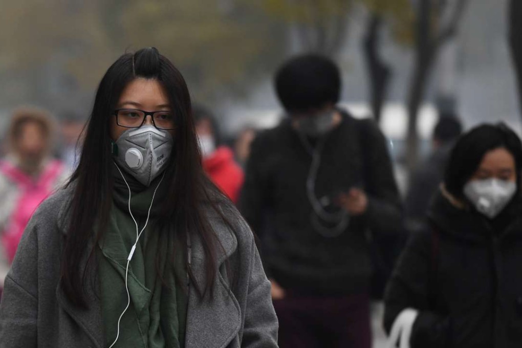 People wear masks as Beijing goes on high alert for pollution. Despite its reputation, the city is far from the world’s – or even China’s – most polluted city. Photo: AFP