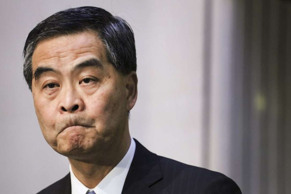 Chief Executive Leung Chun-ying making his shock announcement. Photo: Felix Wong