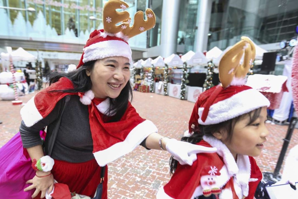 Swire’s annual Santathon ChallengeThe event saw two hundred teams, including parents and children dressed as Santas, competing to win in eight digital mini-games this year. Photo: Xiaomei Chen