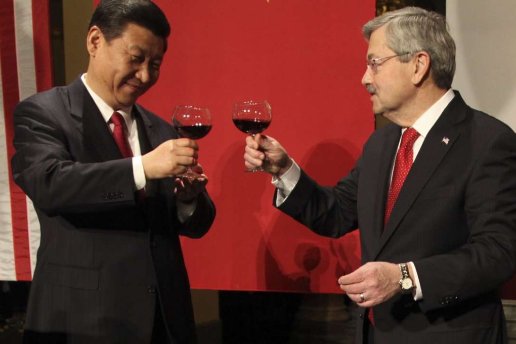 Iowa governor Terry Branstad raises a toast to then vice-president Xi Jinping in the state capital Des Moines on February 15, 2012. Photo: AFP