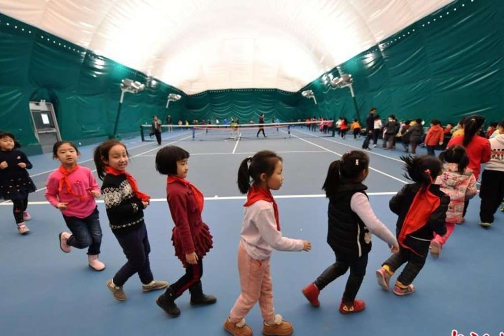 Up to 100 children can play sports inside the inflatable school hall in Shijiazhuang at anyone time. Photo: China News Service