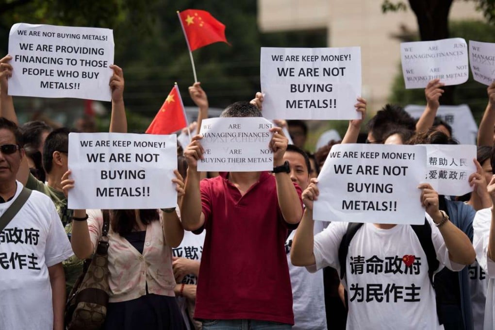 The Chinese insurance regulator is keen to avoid protests such as this 2015 demonstration when investors rallied at the CIRC’s premises after claiming they were tricked by the Fanya metals exchange. Photo: AFP
