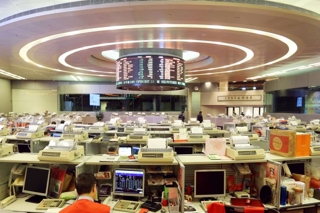 Floor traders are seen at the Hong Kong stock exchange in Central. Photo: Dickson Lee