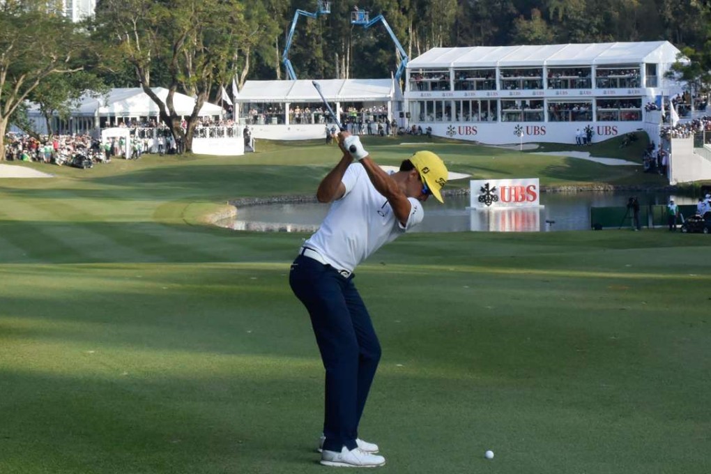 Spain’s Rafa Cabrera Bello plays into the 18th green at Fanling – organisers said 46,728 fans attended the open over the four days. Photo: Richard Castka