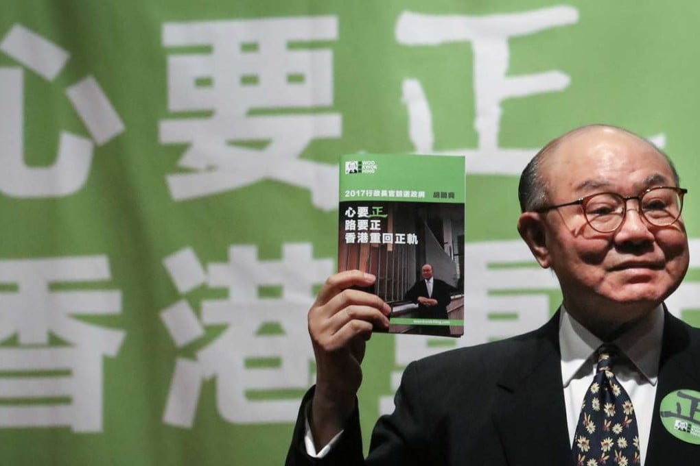 Woo Kwok-hing announces his election platform on Wednesday. Photo: Felix Wong