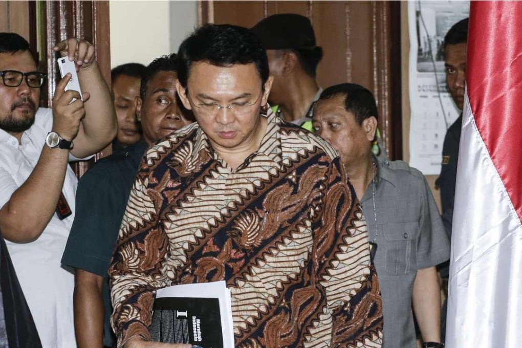 Jakarta Governor Basuki Tjahaja Purnama arrives for his trial hearing, accused of blasphemy due to comments he made in reference to a Koranic verse while campaigning in September 2016. Photo: EPA
