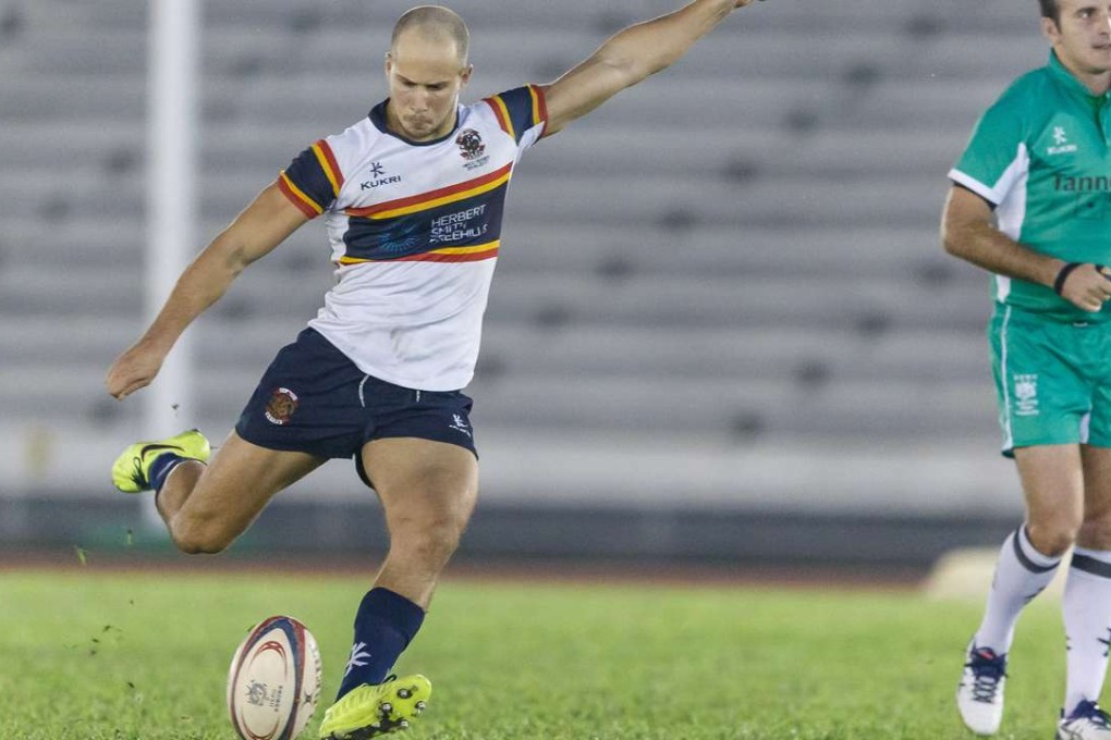 HKCC fullback James Love shoots for goal. Photo: Hong Kong Rugby Union