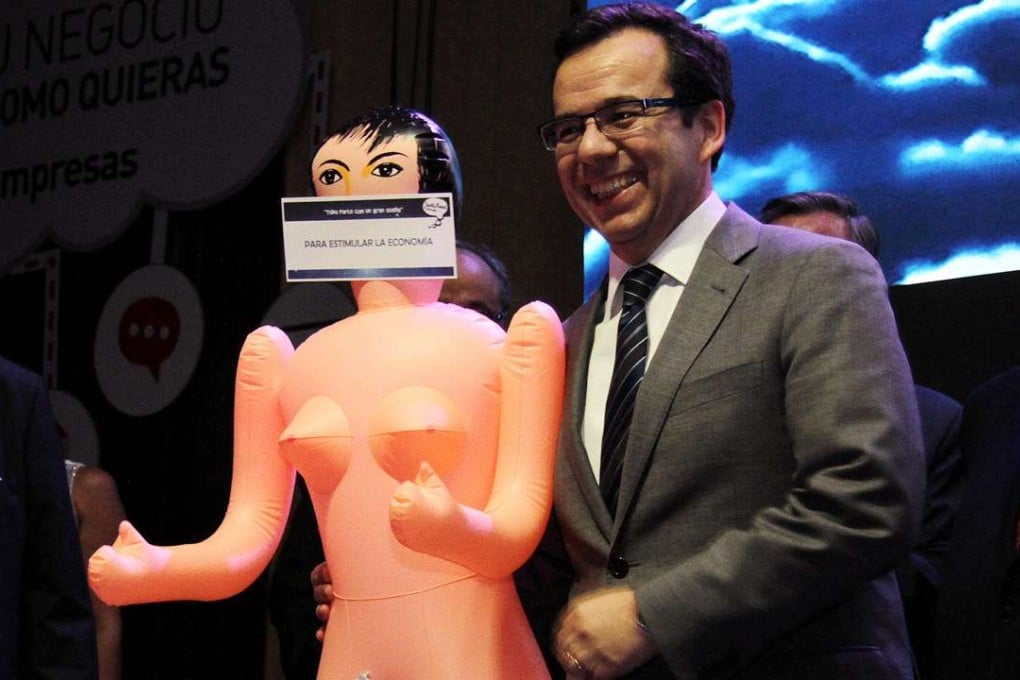 Stimulate the economy': scandal blows up after Chile minister poses with  inflatable sex doll | South China Morning Post