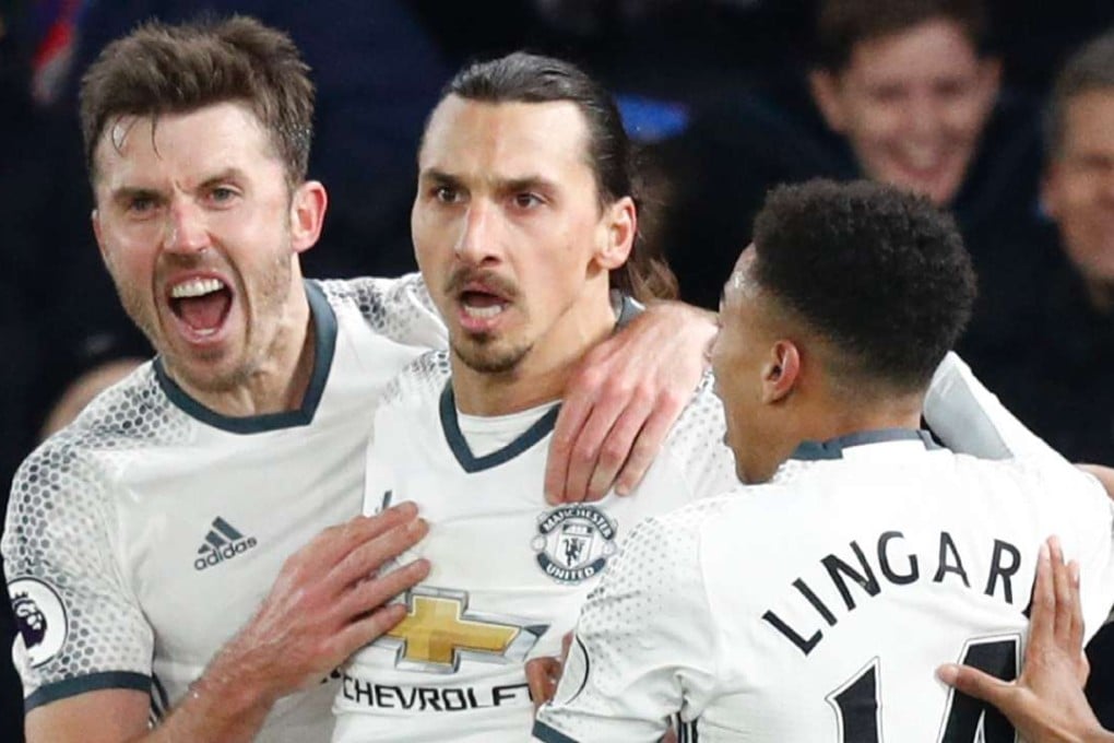 Manchester United's Swedish striker Zlatan Ibrahimovic (2L) celebrates scoring their second goal. AFP