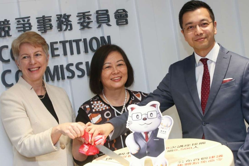 Rose Webb, Anna Wu and commission senior executive director Rasul Butt celebrate the first anniversary of the Competition Ordinance coming into full effect. Photo: David Wong