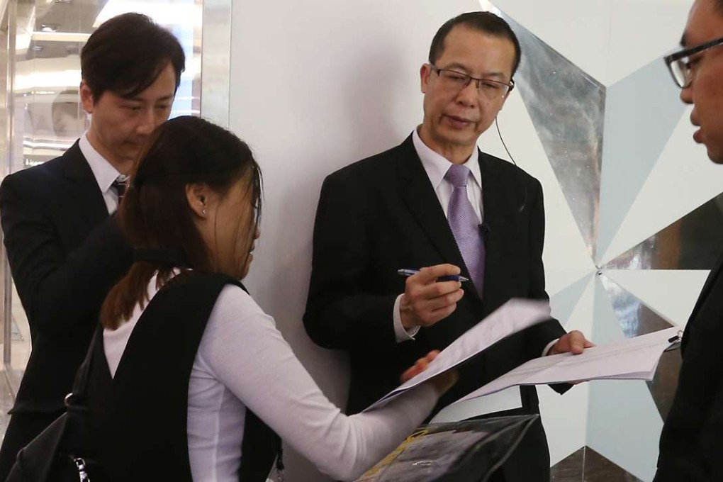 Customers at One Prestige’s sales office in Tsim Sha Tsui. Photo: K. Y. Cheng