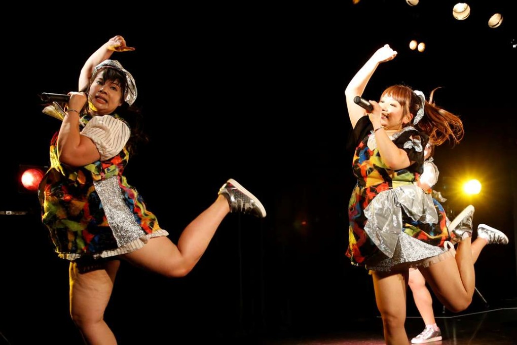 Members of pop group Pottya perform at a theatre in Tokyo. Photo: Reuters