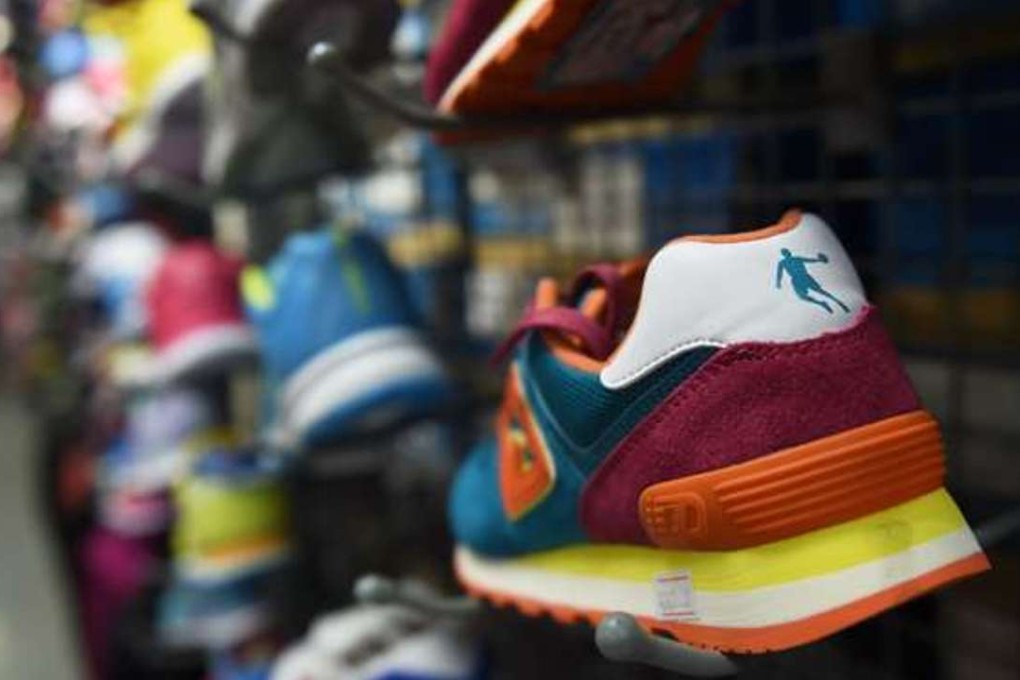 A Qiaodan brand shoe is seen in a store in Beijing. Photo: AFP