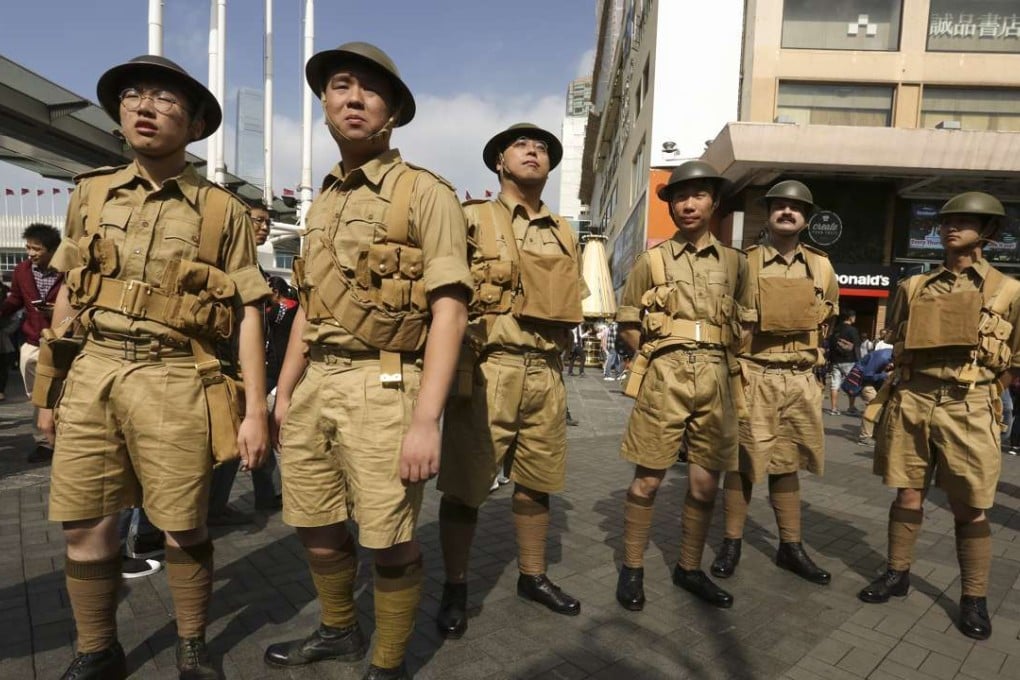 ‘Living Monuments’ volunteers re-enact the Battle of Hong Kong in Tsim Sha Tsui, Hong Kong. Photos: Jonathan Wong