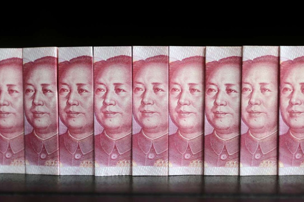 Ministry of Commerce researchers said on Monday that the yuan would likely depreciated 3 to 5 per cent against the dollar in 2017. Photo: Reuters