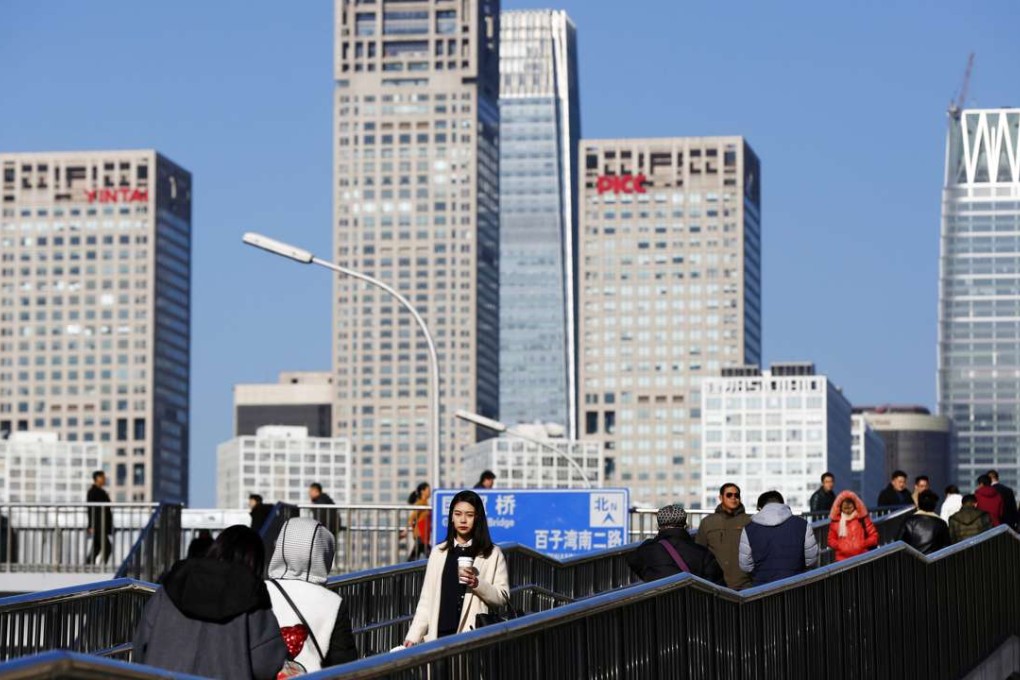 The grim reality is that China’s economy is losing momentum, which leaves the global economy heavily dependent on the US achieving a 4 per cent growth target in 2017. Photo: EPA