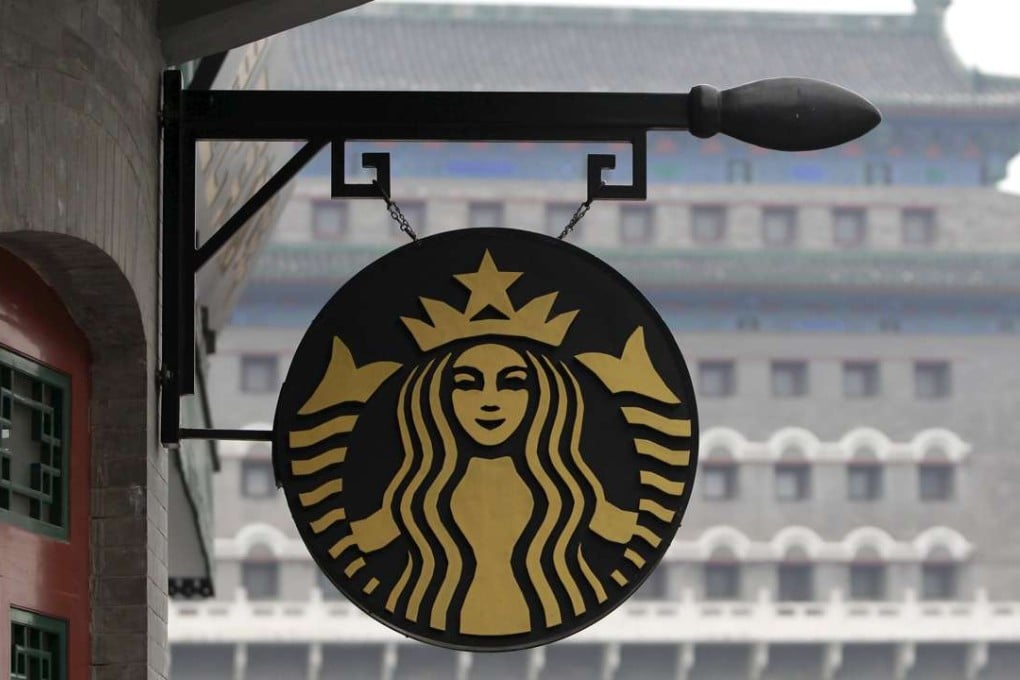 Two department directors from the National Development and Reform Commission and Ministry of Commerce met reporters at a Beijing Starbucks for an usually laid-back talk about China’s economic policy direction. Photo: Reuters
