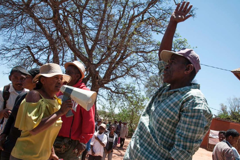 Locals in Soamahamanina protest the presence of the Jiuxing Chinese mining company near the site. The mine had not yet opened, but Madagascans were already seething with rage and the Chinese management finally quit the project, leaving behind empty tents and cigarette butts. Photo: AFP