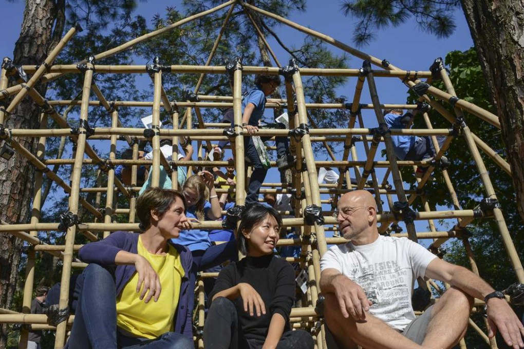 Rachel Wilson (left), Jenna Ho Marris (middle) and model maker Andy Niven at the Bamboo Biodiversity Jungle Gym in Tai Tam. Photo: Antony Dickson