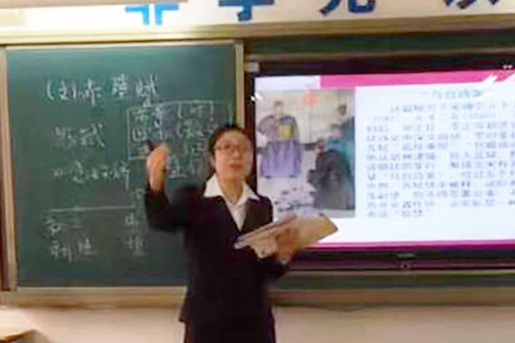 A Xian teacher live-steams a lesson to pupils at their homes on Monday after the city’s authorities ordered schools to close because of the severe air pollution in northern China. Photo: People.cn