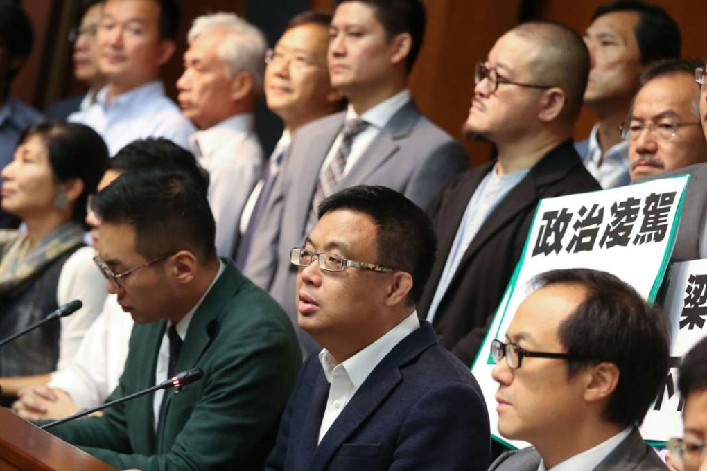Legislator James To Kun-sun (front row, centre) and other pan-democratic lawmakers at LegCo in Tamar. Photo: K. Y. Cheng