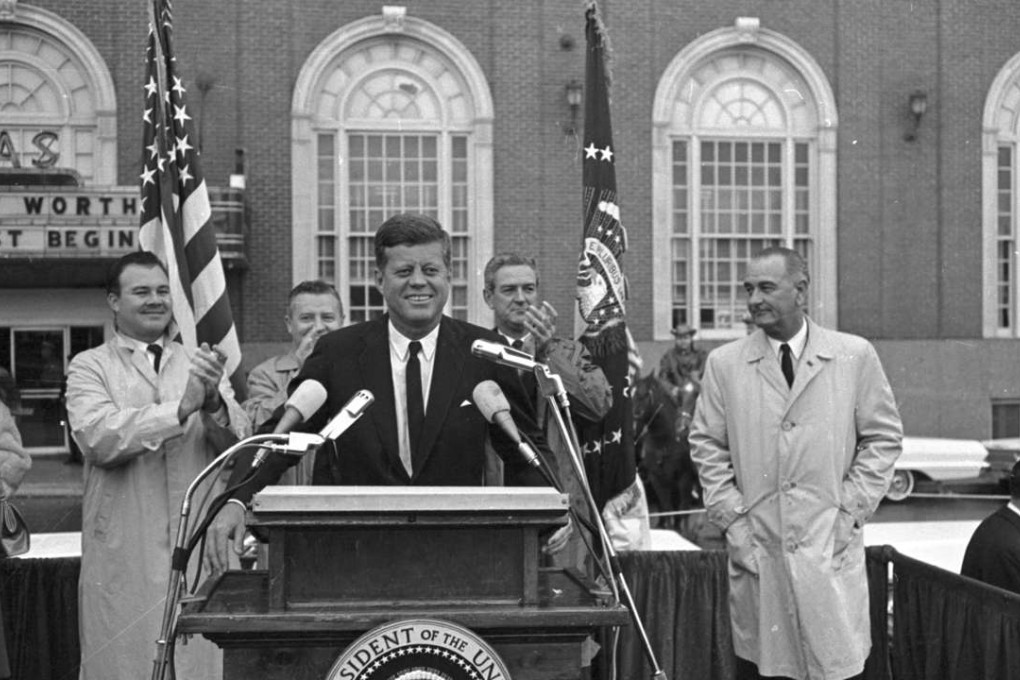 John F. Kennedy speaking to crowd in front of Hotel Texas, Fort Worth. VP Lyndon B. Johnson is to JFK's left and Texas Governor John Connally over JFK's left shoulder, on the morning of November 22, 1963 hours before he was assassinated. Photo: Star-Telegram Collection/TNS