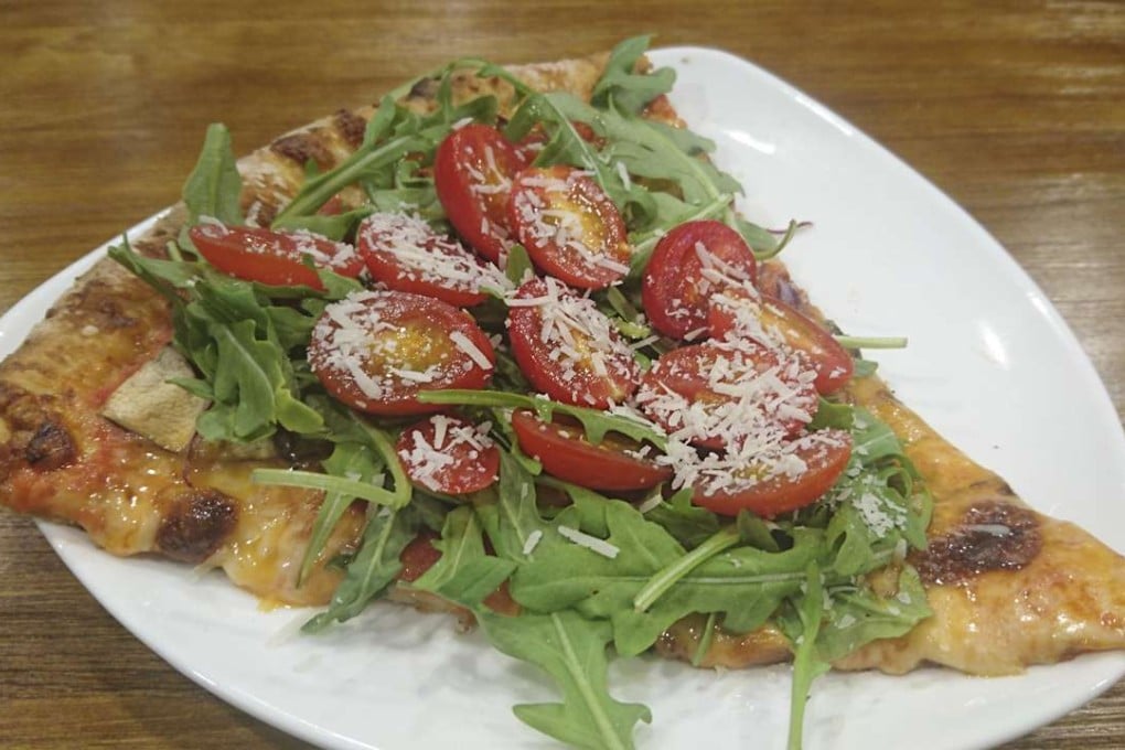 A slice of rocketeer pizza at Mother of Pizzas in Causeway Bay. Photos: Elaine Yau